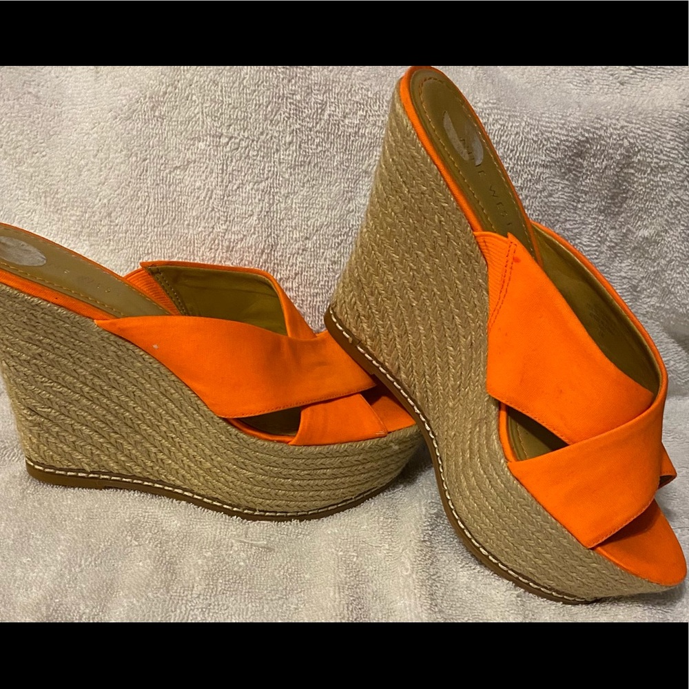 Nine West bright orange wedge sandals.